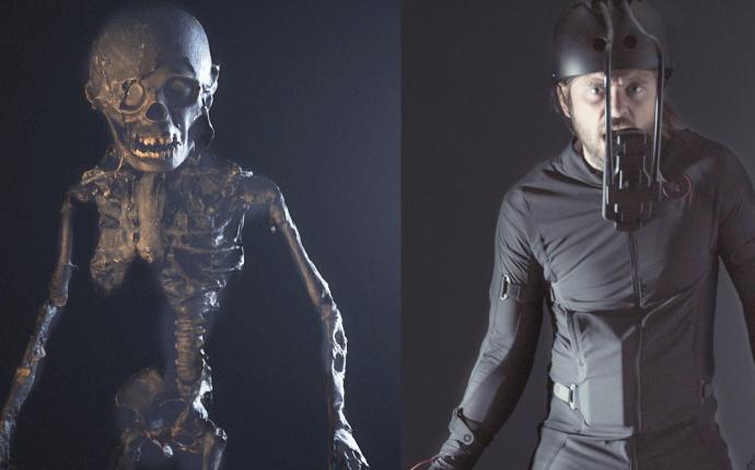 Ett skelett och en kille med en svart dräkt och en kamera framför ansiktet.