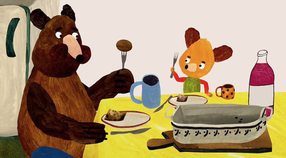 Två tecknade björnar sitter vid ett bord och äter.